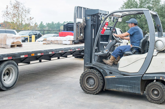 Man driving forklift in Westbridge