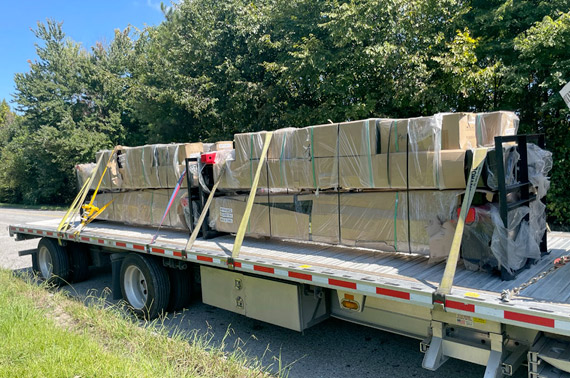 Flatbed semi truck loaded with boxes in Jonesboro